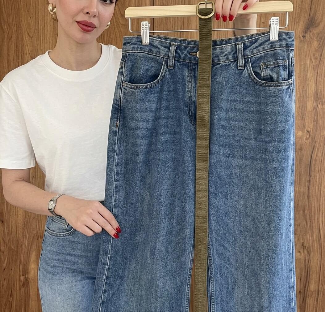 Woman holding a jean